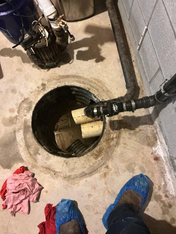 Replaced existing Liberty sump pump and separate Watchdog battery backup system with a Level 1 all-in-one primary and battery backup unit in sealed crock basin. Upon completion of installation, resealed the crock lid to maintain proper basin integrity and system functionality.