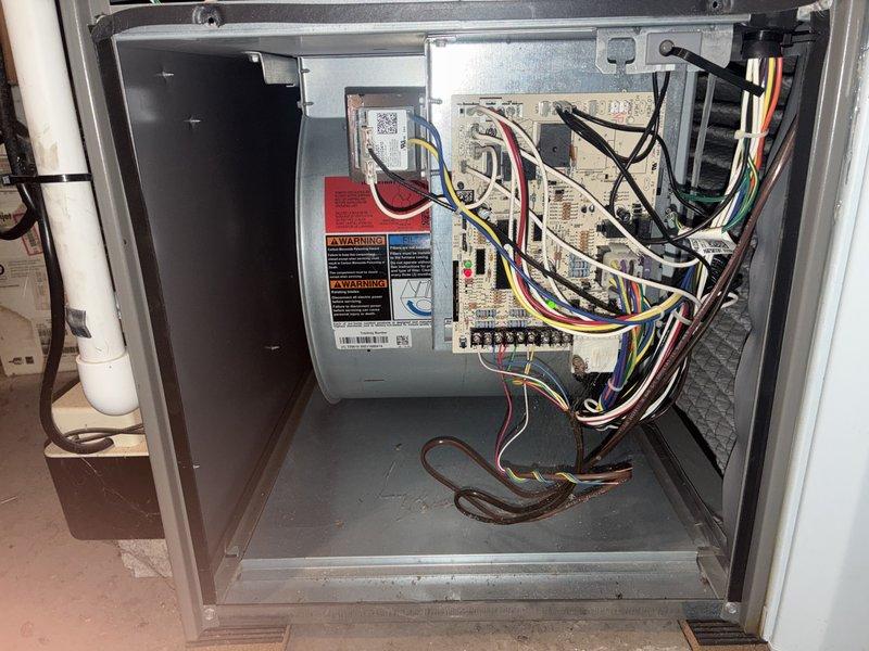 Completed scheduled MVP cooling maintenance visit on 3-year-old HVAC system. Performed comprehensive inspection of air handler unit, including visual examination of control board, electrical connections, and wiring harness. All colored wire terminals verified secure at circuit board connections. Blower compartment and internal components inspected and found in normal operating condition. Equipment properly tagged with QR code identification label for service tracking. System operational and functioning within normal parameters upon completion of maintenance visit.