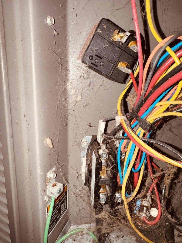 Completed scheduled maintenance visit on two air conditioning units and one mini-split system. Upon inspection, discovered a failed capacitor in one unit showing significant charring and heat damage. Replaced damaged capacitor and verified proper electrical connections throughout all systems. Cleaned accumulated debris from unit interiors, inspected wiring harnesses and terminal connections, and tested all equipment for proper operation. All three systems are now functioning correctly with no further issues identified.