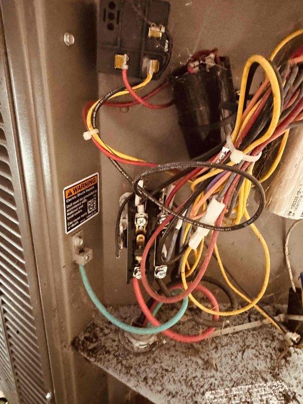 Completed scheduled maintenance visit on two air conditioning units and one mini-split system. Upon inspection, discovered a failed capacitor in one unit showing significant charring and heat damage. Replaced damaged capacitor and verified proper electrical connections throughout all systems. Cleaned accumulated debris from unit interiors, inspected wiring harnesses and terminal connections, and tested all equipment for proper operation. All three systems are now functioning correctly with no further issues identified.