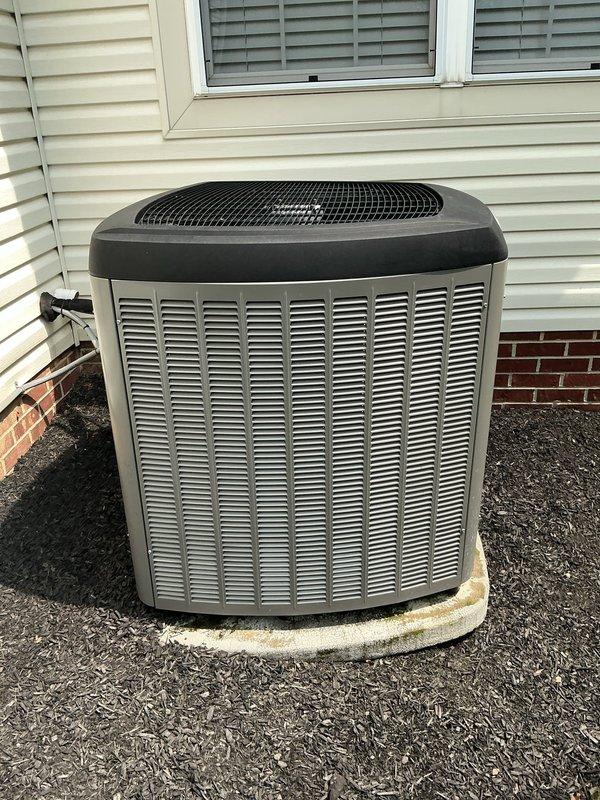Responded to service call for 6-year-old air conditioning system with thermostat malfunction and inadequate temperature control. Upon inspection of the outdoor condensing unit and electrical connections, documented existing installation conditions including exterior electrical components, PVC conduit routing, and AC unit placement. System evaluated for proper operation and potential control board or thermostat issues affecting temperature regulation performance.