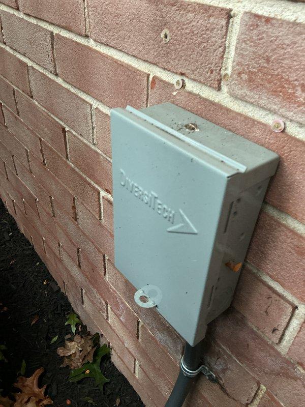 Completed MVP Cooling Visit recurring service maintenance on residential HVAC system. Performed comprehensive inspection of dual outdoor condensing units installed on exterior brick wall with concrete pad mounting. Verified proper operation of both heat pump units, inspected refrigerant line sets and electrical conduit connections running along building exterior. Checked SilverTech electrical disconnect box for secure mounting and proper weatherproofing. Confirmed all components functioning within normal parameters with no immediate service needs identified. System operational and ready for continued cooling season performance.