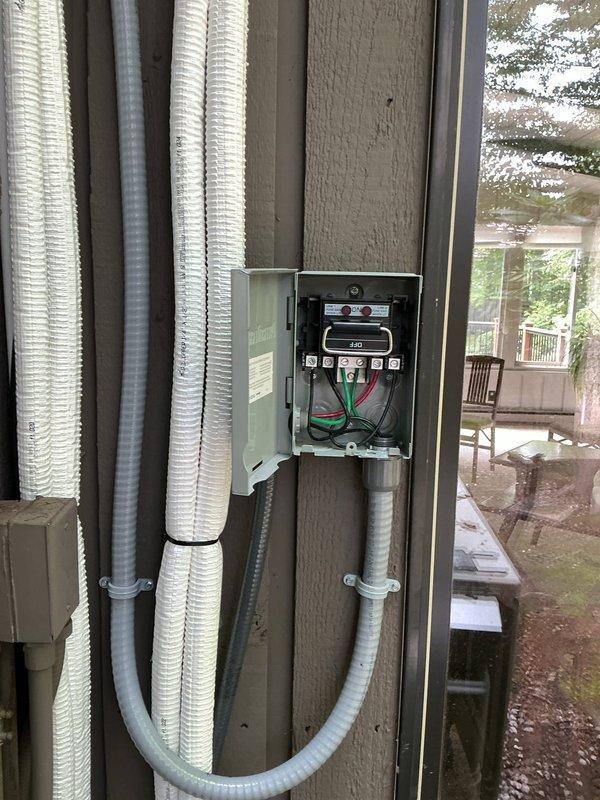 Installed a recessed subpanel in the garage to the right of the existing main electrical panel to increase circuit capacity. Relocated two circuits from the main panel to the new subpanel to accommodate the installation of the subpanel feeder breaker, completing all necessary wiring connections and ensuring proper grounding throughout the installation.