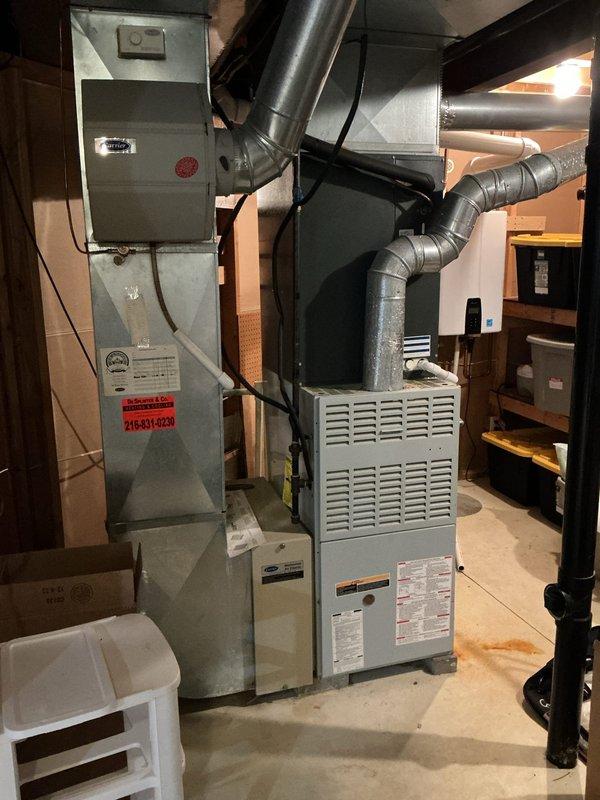 Responded to service call for AC unit tripping breaker and blowing warm air. Upon arrival, inspected Amana outdoor condensing unit and indoor air handler system. Diagnosed electrical issue causing breaker to trip and identified failed compressor contactor preventing proper cooling cycle. Replaced faulty contactor, tested electrical connections, and verified proper amperage draw. System restored to normal operation with cold air discharge confirmed at supply registers.