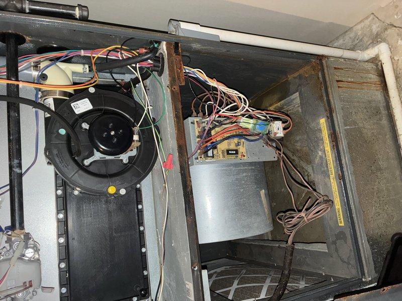 # HVAC Maintenance - Cooling

Performed comprehensive annual air conditioning tune-up on a 10-year-old system with no reported operational issues. Inspection revealed significant dust accumulation on blower wheel assembly and internal components, along with visible rust and corrosion on metal framework and support structures. Conducted thorough system evaluation including examination of blower motor, capacitor, control board connections, and electrical wiring throughout the unit. All major components were assessed for proper operation and wear patterns consistent with the system's age.