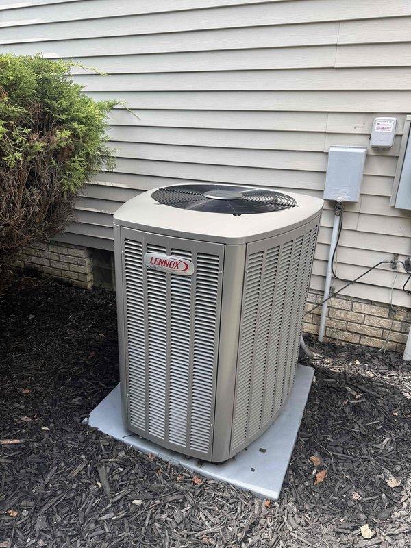 Completed preventive maintenance service on a two-year-old Lennox air conditioning system with no reported operational issues. Performed comprehensive AC tune-up including inspection of outdoor condensing unit, verified proper electrical connections at disconnect box, examined control boards and wiring harnesses inside unit compartment, checked condensate drainage system components, and confirmed all safety labels were intact. Unit operating within normal parameters with all systems functioning properly at time of service completion.