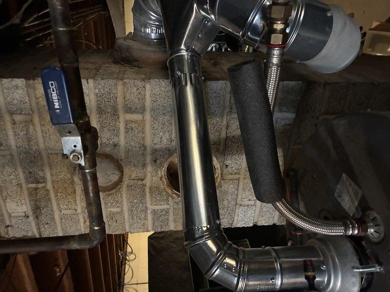 Completed repair and replacement of flue piping on hot water heater and furnace system, along with gas line repairs. Installed new polished stainless steel vent pipe sections with proper elbow connections to ensure code-compliant venting and safe exhaust routing. Repaired compromised gas line to restore safe fuel delivery to appliances. Parts were ordered and received at shop prior to service completion. Total labor time was approximately 2 hours. All components were tested and verified operational upon completion of repairs.