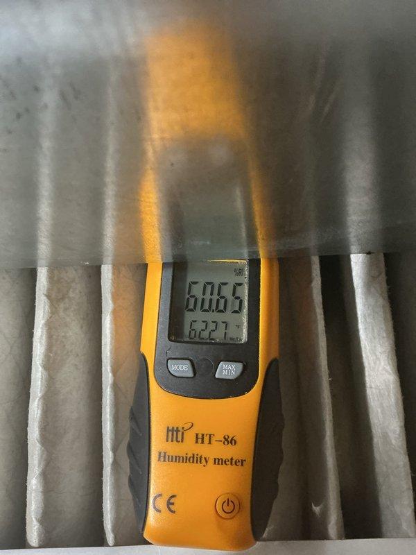 Completed MVP cooling maintenance visit and performed system diagnostics. Measured supply and return air temperatures using calibrated digital instruments, recording 51.7°F and 44°F readings at the ductwork and insulation areas. Conducted humidity measurements at the evaporator coil assembly, documenting readings of 60.5% and 62.7% to verify proper system operation and moisture removal. All measurements indicate the cooling system is functioning within normal operating parameters for this recurring maintenance service.