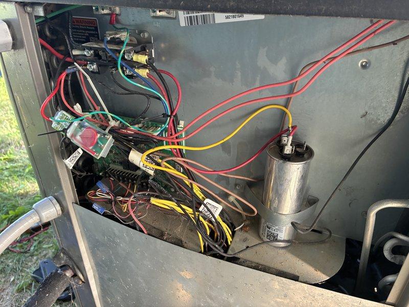 Completed MVP cooling maintenance visit on dual outdoor condenser unit system. Opened access panel on primary unit, inspected electrical components including capacitor, contactor, and control board—all found in operational condition with wiring connections secure. Performed thorough coil cleaning on both condenser units as requested, removing accumulated dirt, debris, and weathering buildup from exterior fins and coil surfaces. System tested and operating within normal parameters upon completion.
