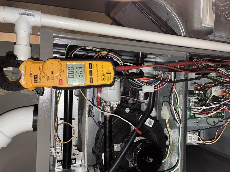 Completed MVP recurring maintenance visit on Lennox heating system. Performed comprehensive diagnostic testing using digital multimeter to verify electrical circuits, voltage readings, and system controls were operating within manufacturer specifications. Inspected internal components including blower motor assembly, control board, and all electrical connections. Verified proper operation of condensate drainage system and PVC piping. System tested and confirmed to be functioning properly with all components operating as designed.