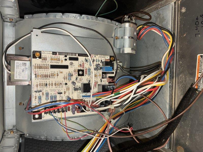 Completed MVP preventive maintenance service on residential air conditioning system. Performed comprehensive inspection of outdoor condenser unit and indoor control components, verified proper operation of electronic control board and all electrical connections, and documented equipment condition with photographs. All system components found operating within normal parameters with condenser coils and controls in satisfactory condition.