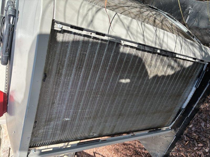 Completed MVP preventive maintenance service on residential air conditioning system. Performed comprehensive inspection of outdoor condenser unit and indoor control components, verified proper operation of electronic control board and all electrical connections, and documented equipment condition with photographs. All system components found operating within normal parameters with condenser coils and controls in satisfactory condition.