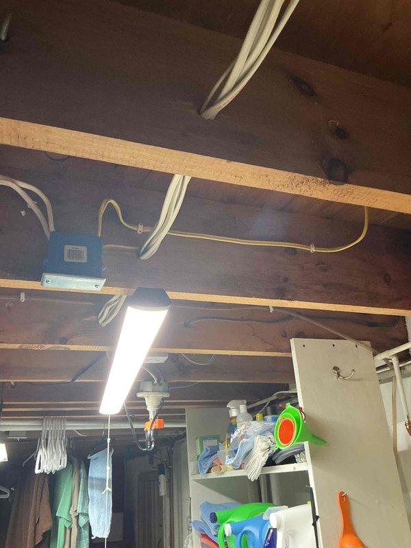 Responded to non-functional dishwasher outlet and discovered existing circuit was not up to code. Removed non-compliant wiring from junction box in basement and installed new dedicated line using flexible conduit run to surface-mounted four-square box with duplex receptacle in cabinet. Added GFCI protection at electrical panel to bring installation into compliance with current electrical code requirements.