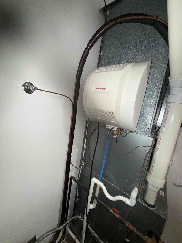 Completed MVP cooling maintenance visit on three HVAC systems. Performed comprehensive inspection of all units, including examination of electrical components, control boards, and refrigerant lines. Documented existing conditions including minor corrosion observed at base of one unit and verified proper operation of humidification system connections and water supply lines. All systems tested and confirmed operational for cooling season.