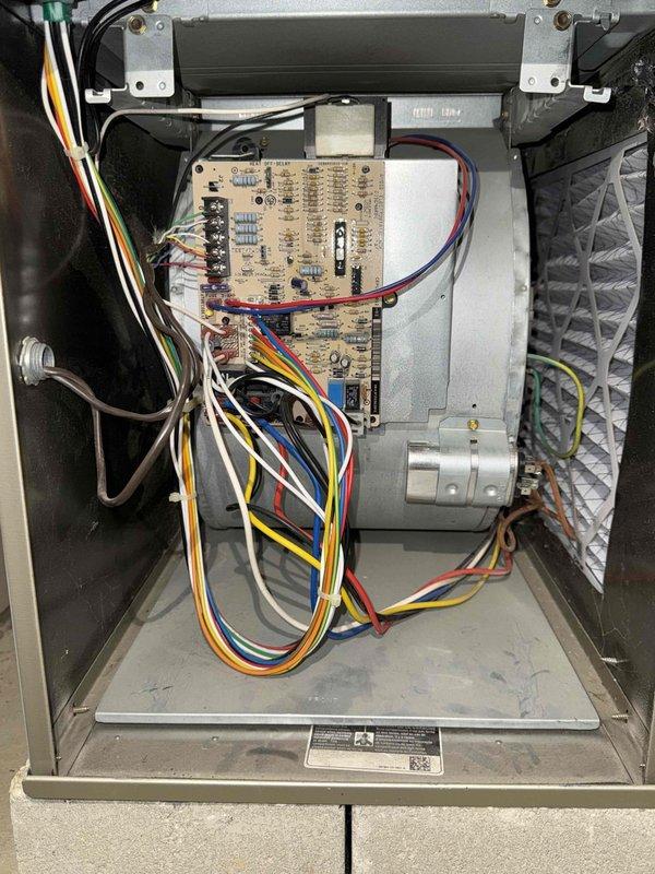 Completed MVP recurring cooling maintenance visit on 14-year-old Carrier HVAC system. Performed comprehensive inspection of indoor unit components including control board, electrical connections, capacitor, and blower motor assembly. Verified proper operation of all system controls and safety devices. Documented equipment condition through photographic records showing accessible components within cabinet and overall installation configuration. All components found operating within normal parameters for unit age.