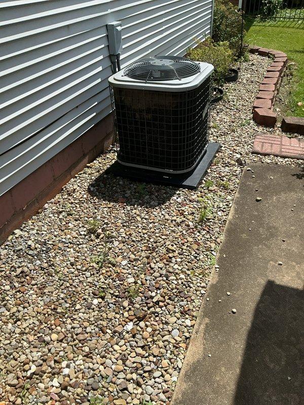 Completed scheduled preventive maintenance on 6-year-old residential air conditioning system. Performed comprehensive inspection of outdoor condenser unit, verified proper operation of fan motor and compressor, checked refrigerant levels, and cleaned condenser coils. Unit operating within normal parameters with no issues identified.