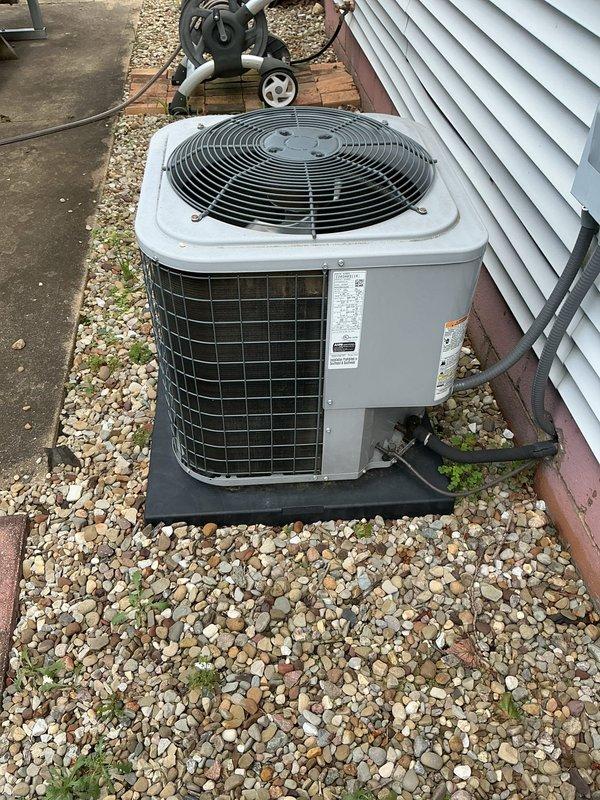 Completed scheduled preventive maintenance on 6-year-old residential air conditioning system. Performed comprehensive inspection of outdoor condenser unit, verified proper operation of fan motor and compressor, checked refrigerant levels, and cleaned condenser coils. Unit operating within normal parameters with no issues identified.