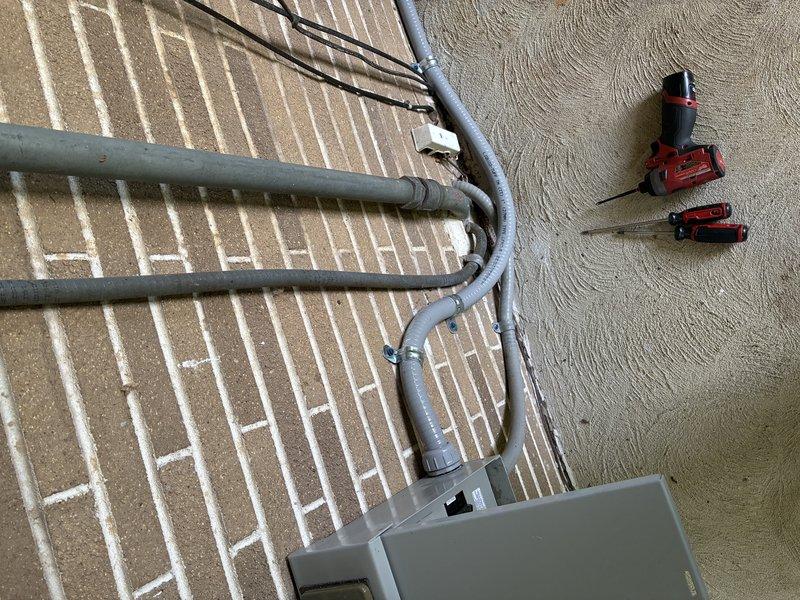 Replaced existing Romex and carflex whip with THHN conductors running from disconnect to junction box for new hot tub installation, ensuring code-compliant wiring throughout the circuit. Replaced ceiling fan in kitchen and advised customer that new fixture will not fully cover previous mounting location, potentially exposing discoloration or drywall imperfections requiring separate cosmetic repair.