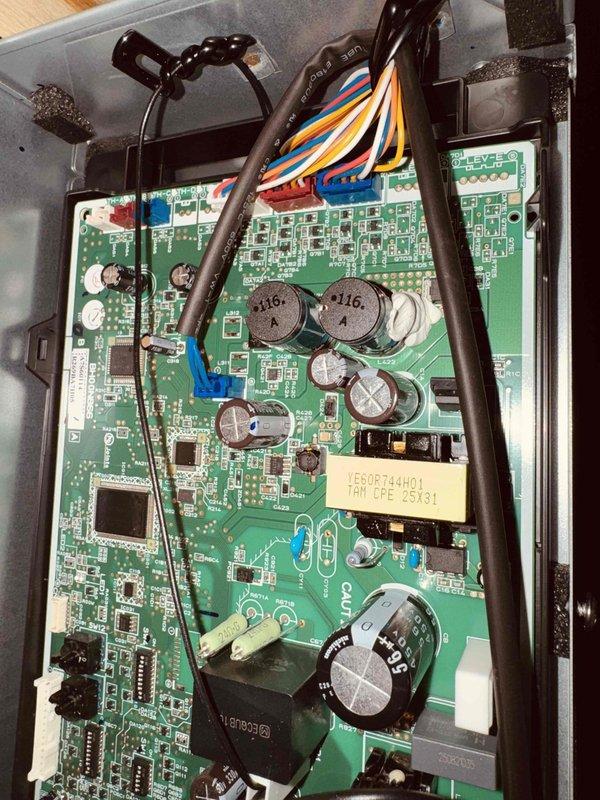 Performed follow-up service call to address ongoing comfort concerns and system performance issues. Recovered existing refrigerant charge from system and performed accurate weigh-in procedure using manufacturer specifications to ensure proper refrigerant levels. Inspected and verified branch box settings and addressing configuration on control board to confirm proper system operation. System had previously experienced charging difficulties during installation and recent loss of cooling capacity during high ambient temperatures. Verified all ductwork repairs, sealing, and upsizing modifications completed during previous visit remained intact and functional. Confirmed 26-degree temperature split across evaporator coil indicates proper heat transfer and system performance now operating within manufacturer specifications.