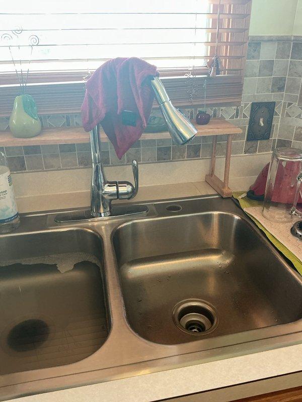 Responded to emergency call for tub faucet stuck in open position with no accessible shut-off valves. Located and operated main water shut-off to stop water flow. Inspected bathroom plumbing system and identified faulty tub faucet mechanism causing continuous water discharge. Repaired or replaced defective faucet components to restore proper operation and water control.