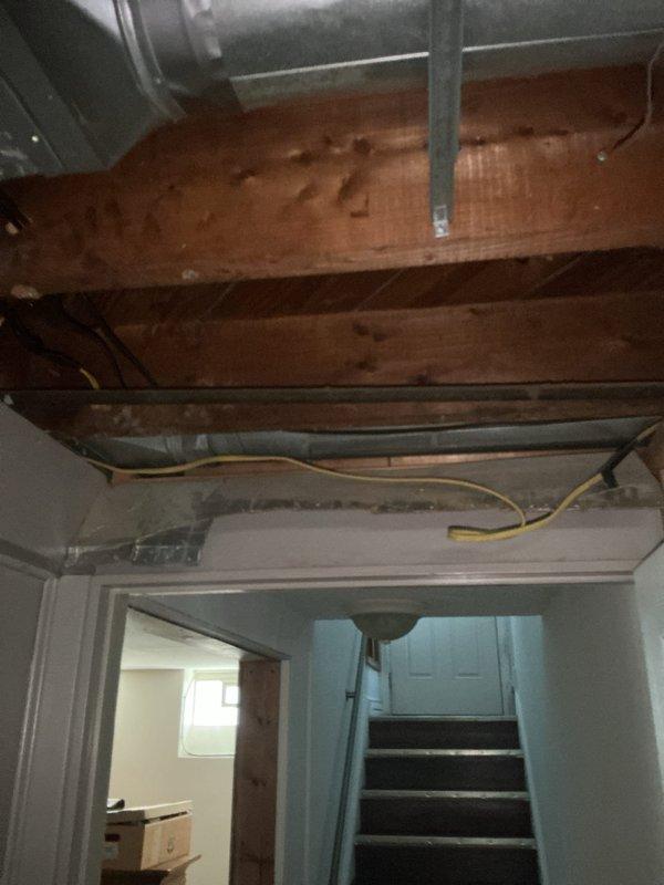 Responded to service call for 3-month-old air conditioning unit running continuously without cycling off. Upon inspection, identified malfunctioning printed circuit board (PCB) preventing proper thermostat communication and system shutdown. Customer had been manually turning off unit at breaker to stop operation. Documented attic installation and basement mechanical areas, noting system configuration and wiring paths. Assessed control board failure as primary cause of continuous operation issue and provided recommendations for PCB replacement to restore normal cycling function.