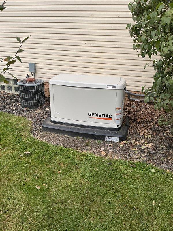 Responded to service call for one-year-old Generac standby generator displaying alternating yellow and green indicator lights. Performed diagnostic battery testing using electronic load tester, which revealed battery voltage and cold cranking amp issues. Conducted full system inspection of the generator unit, verified electrical connections, and tested battery terminals to identify the source of the status light malfunction.