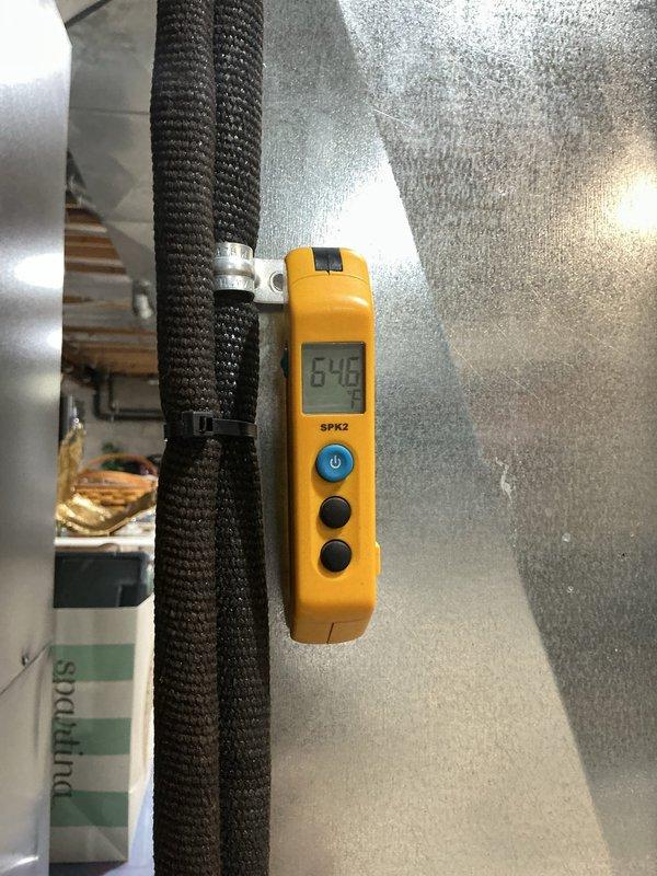 Performed comprehensive AC tune-up on 5-year-old cooling system. Conducted system diagnostics using digital measuring equipment to verify airflow and operational parameters, with readings indicating proper system performance at 642 CFM. Inspected and evaluated air filter condition, noting moderate dust accumulation on pleated media; filter remains serviceable but approaching replacement interval. Completed standard maintenance protocol including visual inspection of ductwork, refrigerant lines, and system components to ensure optimal cooling system operation for the season.