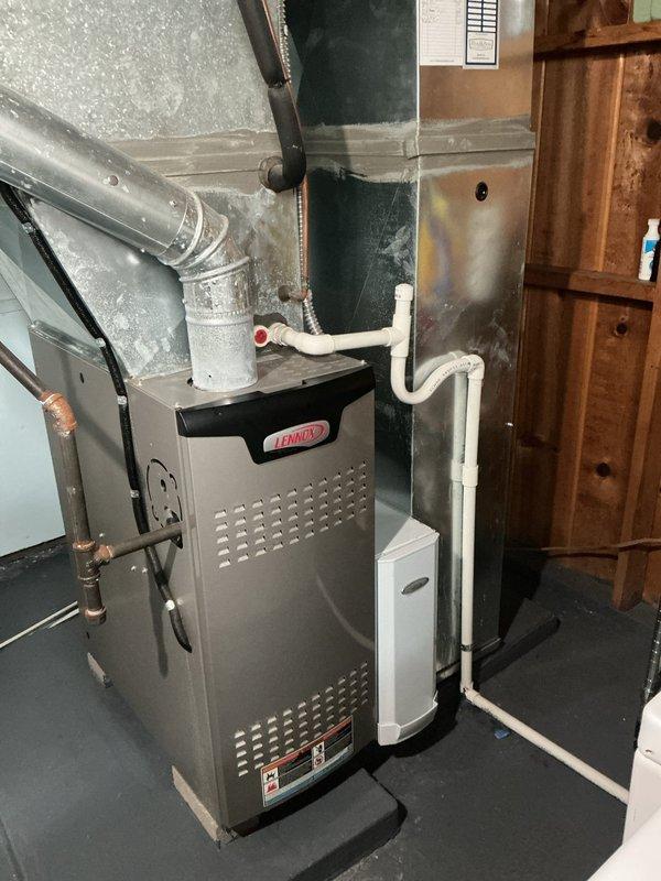 Responded to no cooling call and customer report of condensation on furnace exterior. Upon arrival, performed system inspection of Lennox furnace and outdoor condensing unit. Replaced air filter and verified proper system operation. Conducted visual inspection of both indoor and outdoor equipment, including refrigerant lines, condensate drainage system, and electrical connections. All components found to be functioning within normal parameters with no refrigerant leaks or drainage issues identified at time of service.