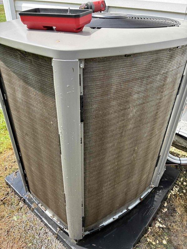 Completed preventive maintenance cooling visit on residential HVAC system. Inspected outdoor condensing unit and indoor Lennox furnace with cooling coil, cleaned condenser coils of accumulated debris and dust, verified refrigerant lines and condensate drainage system operation, and confirmed all components functioning properly. System tested and left in good working order for continued cooling season operation.