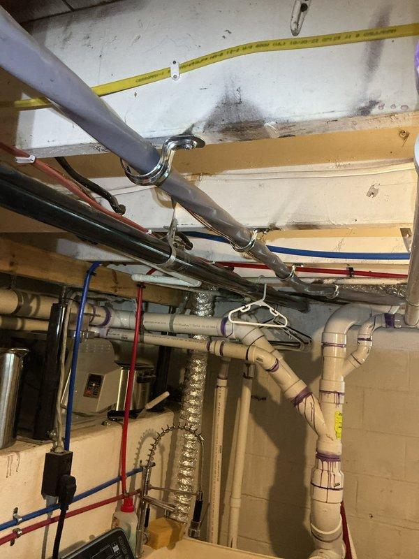 Responded to failed electrical inspection for warranty work. Corrected improper PVC conduit installation by applying approved solvent cement to all unglued joints and replaced non-compliant straps with appropriate electrical-rated hangers per NEC requirements. All conduit runs secured properly to structural members with correct spacing. Work inspected and approved for code compliance.