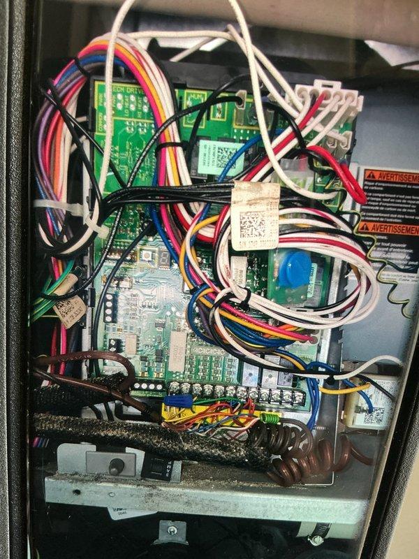Completed scheduled MVP cooling maintenance visit. Inspected refrigeration lines showing oxidation and patina buildup on copper tubing, photographed for documentation purposes. Examined control board assembly and verified proper wiring connections throughout electrical cabinet, confirmed all electronic components and safety labels intact and system operational.
