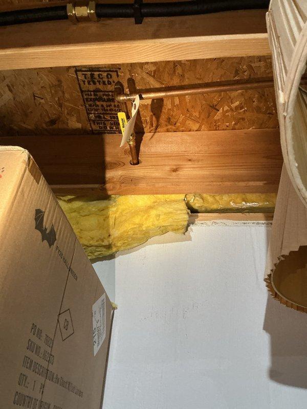 Responded to emergency call for outdoor water spigot leaking into basement. Upon inspection, identified failed connection at exterior hose bib where copper pipe penetrated brick foundation, allowing water to flow through foundation opening and into interior space below. Accessed plumbing from basement side, replaced defective fittings and connections at spigot penetration point, and properly sealed foundation opening to prevent further water intrusion.