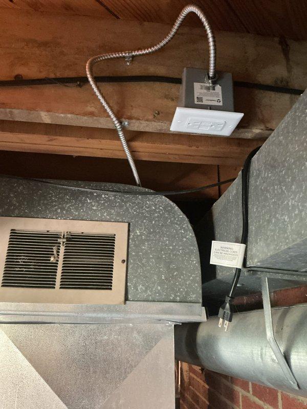 Installed dedicated electrical circuit for dehumidifier in basement mechanical room. Ran metallic flexible conduit from main electrical panel to new junction box mounted on ceiling joist, routing through attic space alongside existing HVAC ductwork. Circuit tested and verified operational upon completion.