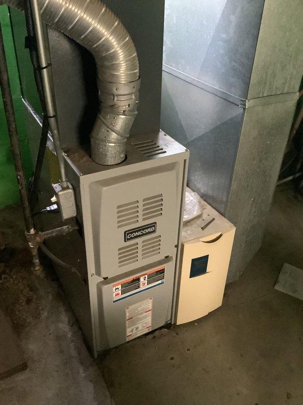 Conducted comprehensive HVAC system evaluation for furnace and air conditioning replacement estimate. Assessed existing Concord brand furnace installation in basement mechanical room, including ductwork configuration, plenum connections, and flexible duct routing. Documented current system specifications, equipment condition, and installation layout through detailed photography. Discussed available financing options and current promotional offerings with homeowner to facilitate equipment upgrade decision.