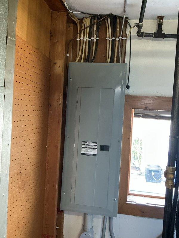 Completed installation of 22kW Generac standby generator system with comprehensive electrical infrastructure upgrades. Performed 200-amp service upgrade to accommodate new generator load requirements, installed 200-amp automatic transfer switch for seamless power transition during outages, and integrated whole-home surge protection device to safeguard electrical systems. Ran 20 feet of electrical line from main service panel to generator location and 20 feet of gas supply line to fuel source. Mounted generator on concrete pad with oil warmer accessory for cold-weather operation reliability. Installation executed over two days with service upgrade completed first day followed by generator and transfer switch installation second day. All equipment staged and tested for proper operation, with transfer switch programmed for automatic activation during utility power loss.