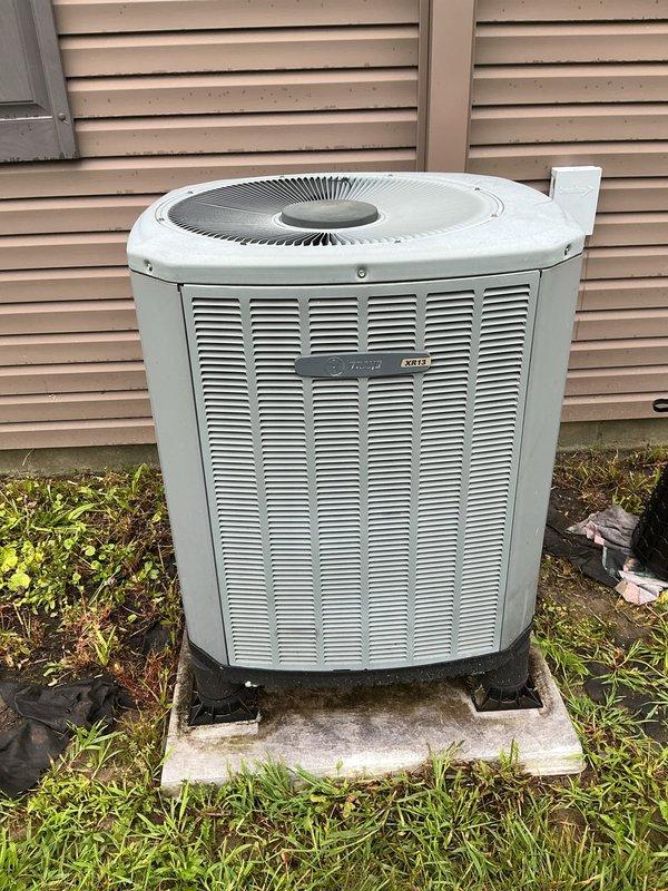 Performed comprehensive tune-up on outdoor heat pump unit. Opened access panel and inspected all electrical components including capacitor, contactor, and control board connections. Verified proper wire terminations and component functionality, documented system condition with photos, and closed unit securely upon completion.