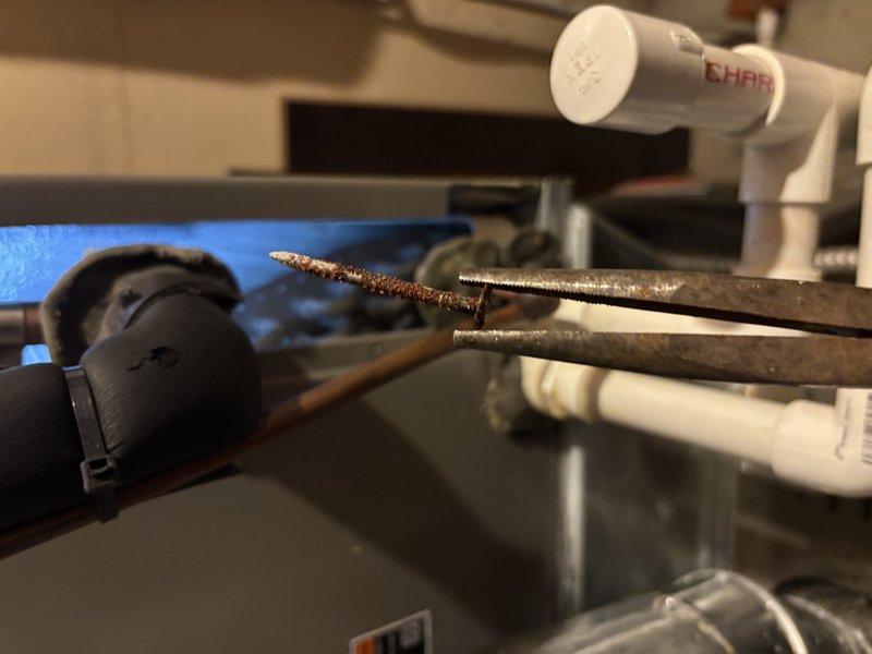 Completed scheduled maintenance on 7-year-old air conditioning system. Inspection revealed significant corrosion on drainage components, which were documented and addressed. Performed standard maintenance procedures including examination of evaporator coil assembly, refrigerant line connections, and condensate system integrity to ensure proper cooling system operation.