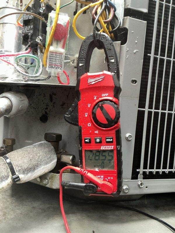 Completed MVP cooling maintenance visit on Carrier brand outdoor condenser unit. Performed system diagnostics including electrical measurements using digital multimeter, recording amperage reading of 48.5 amps at the compressor circuit. Inspected refrigerant lines, electrical connections, control components, and verified proper operation of condenser fan assembly and all system components.
