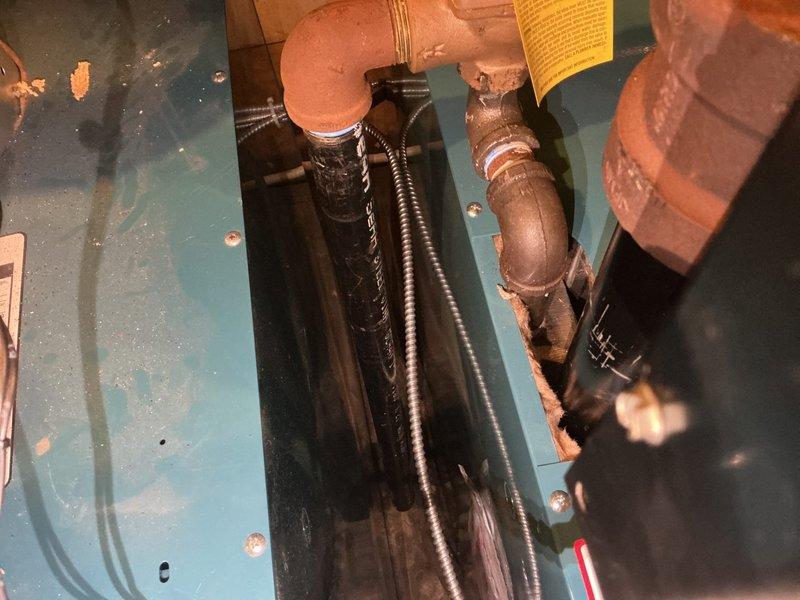 Coordinated commercial boiler installation with equipment and parts delivery to job site. Completed installation of boiler unit with copper piping connections, including horizontal and vertical runs with brass fittings and isolation valves. System tested and verified operational with all connections secure and properly configured in basement mechanical room.