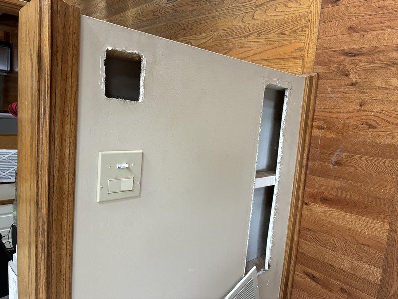 Relocated double light switch approximately one foot from original position per customer request. Installed new electrical box at desired location, cut drywall access openings as needed, and completed wiring connections. Patched and finished wall opening, installed new switch plate cover, and verified proper operation of both switches.