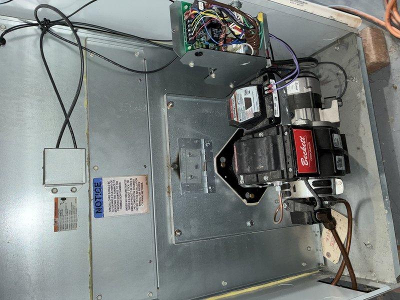 Completed annual MVP cooling maintenance visit on 1-year-old HVAC system. Removed access panels to inspect control board, electrical connections, and blower motor assembly. Verified all wiring connections secure with proper color-coded routing throughout control section. Inspected transformer, circuit boards, and motor components for proper operation and wear patterns. All components functioning within normal parameters with minimal dust accumulation consistent with system age.