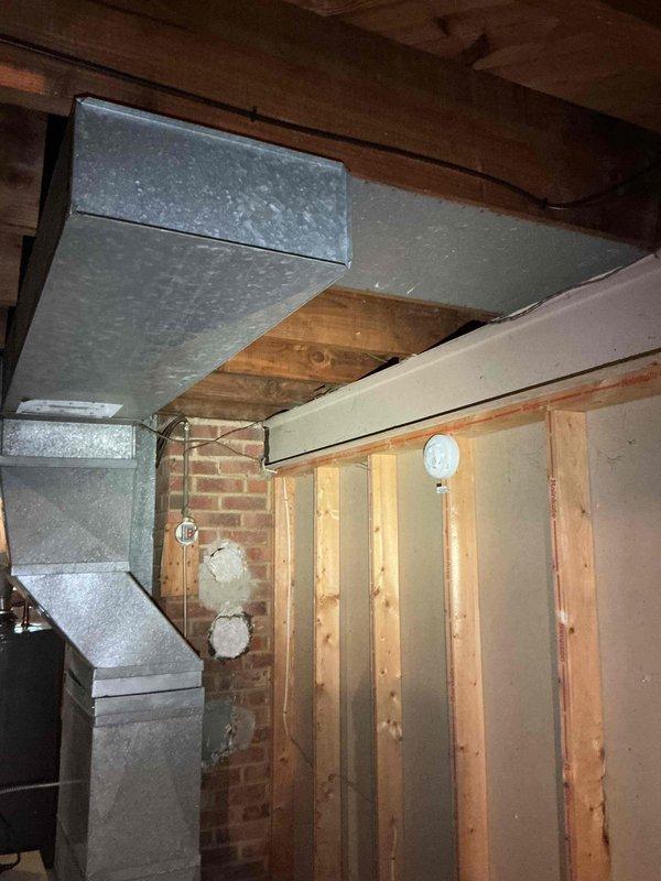 Completed electrical estimate for whole-house generator installation at residential property. Evaluated existing electrical infrastructure including main service panel and available installation locations in unfinished basement utility area. Assessed panel capacity, circuit configuration, and determined optimal placement for generator transfer switch and associated wiring. Documented site conditions with photographs showing current electrical panel setup with multiple circuits serving HVAC, appliances, and lighting loads, as well as basement area with exposed joists, ductwork, and available wall space for equipment mounting. Provided customer with comprehensive estimate for generator system installation including transfer switch, disconnect, and necessary electrical connections.