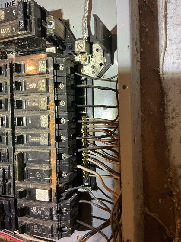 Responded to service call for outdoor lighting circuit requiring wire replacement or repair. Upon inspection, located the affected circuit at the main electrical panel serving the outdoor light fixture. Assessed the condition of the existing wiring and circuit breaker connections. Panel showed signs of age with accumulated dust and debris throughout the enclosure. Traced the circuit routing from the breaker box to identify the wire run serving the outdoor lighting fixture. Documented existing panel conditions and wiring configuration with photographs for service records. Inspected all circuit breaker connections and wire terminations within the panel for proper securement and functionality related to the outdoor lighting circuit.