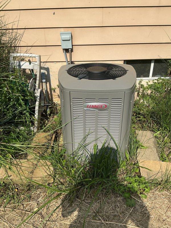 Completed preventive maintenance on 6-year-old Lennox air conditioning system. Performed comprehensive tune-up including inspection of outdoor condenser unit and indoor air handler, verified proper refrigerant levels via copper line set, checked electrical connections at disconnect box, cleaned condenser coils, inspected fan operation, tested system controls, and verified proper drainage through PVC condensate lines. Noted vegetation growth around outdoor unit and recommended clearance maintenance for optimal airflow and efficiency. All components operating within manufacturer specifications upon completion.