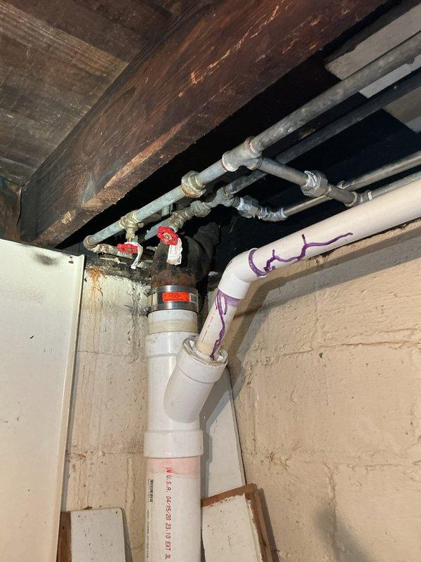Conducted comprehensive assessment of existing tanked water heater system in 1923-era residential property with original galvanized steel supply lines. Evaluated current plumbing infrastructure including exposed basement piping, existing shut-off valves, and connection points for potential water heater replacement. Provided detailed quote for new tanked water heater installation, including removal and disposal of existing unit, connection to current galvanized supply lines, and proper venting requirements. Discussed options for automatic shut-off valve installation to provide leak protection during extended absences, explaining placement recommendations and integration with existing plumbing system. Presented comprehensive whole-home repipe proposal to upgrade from deteriorating galvanized steel lines to PEX-A piping throughout residence, noting advantages of corrosion resistance, improved water flow, and elimination of potential lead contamination from century-old galvanized pipes. Do