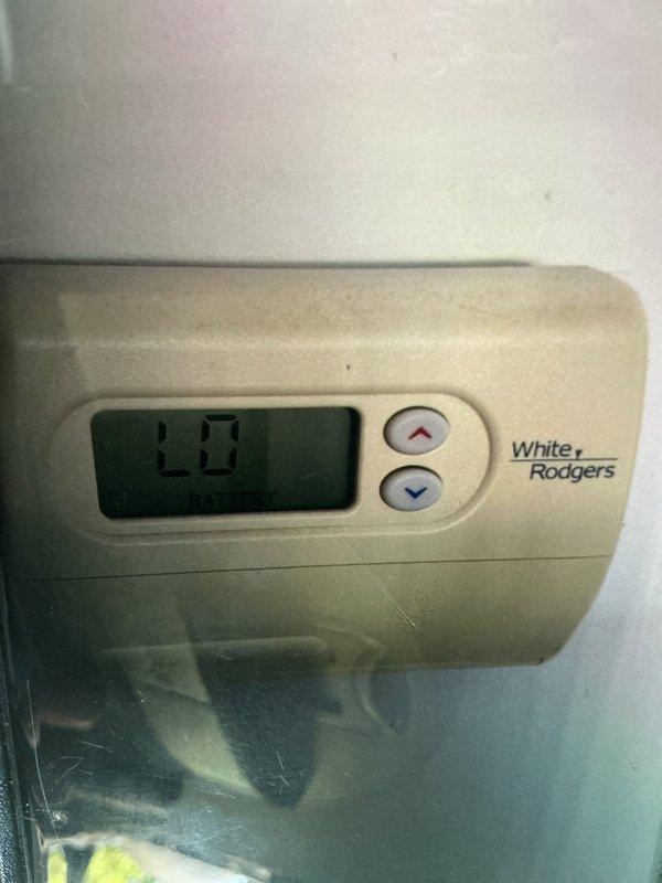 Completed MVP air conditioning maintenance service at 8am as confirmed. Performed system inspection and documented thermostat operation showing 20-degree display reading on White-Rodgers unit. Observed evaporator coil with moderate dust and debris accumulation on fins, indicating need for routine cleaning to maintain optimal airflow and system efficiency.