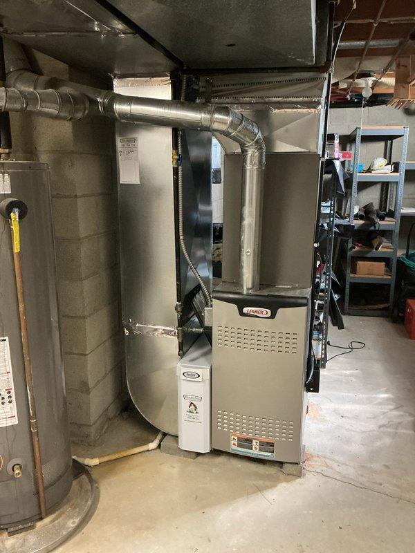 Completed MVP preventive maintenance inspection on Lennox cooling system. Inspected indoor furnace unit in basement mechanical room and outdoor condenser unit, verifying proper operation of all components, checking refrigerant levels, cleaning condenser coils, and confirming adequate airflow through both units. System operating within manufacturer specifications with no deficiencies noted.
