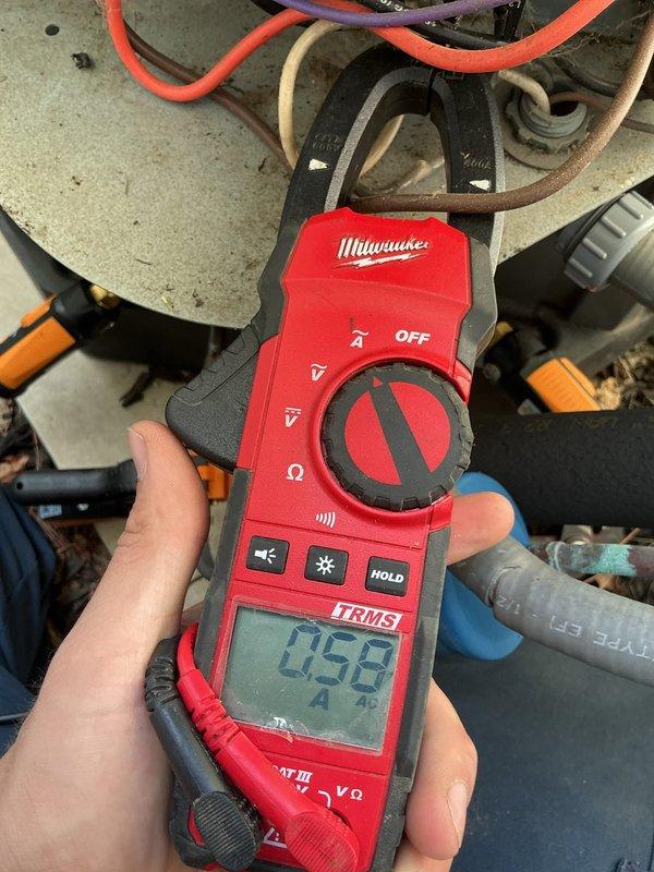 Completed MVP cooling maintenance visit on 8-year-old system. Performed electrical diagnostics using digital clamp meter, recording amperage readings of 0.58A and 755A at various system components. Inspected outdoor unit's electrical panel, contactor assembly, and wire connections. Verified proper operation of all electrical components including control circuits and power connections. System tested and operating within normal parameters.