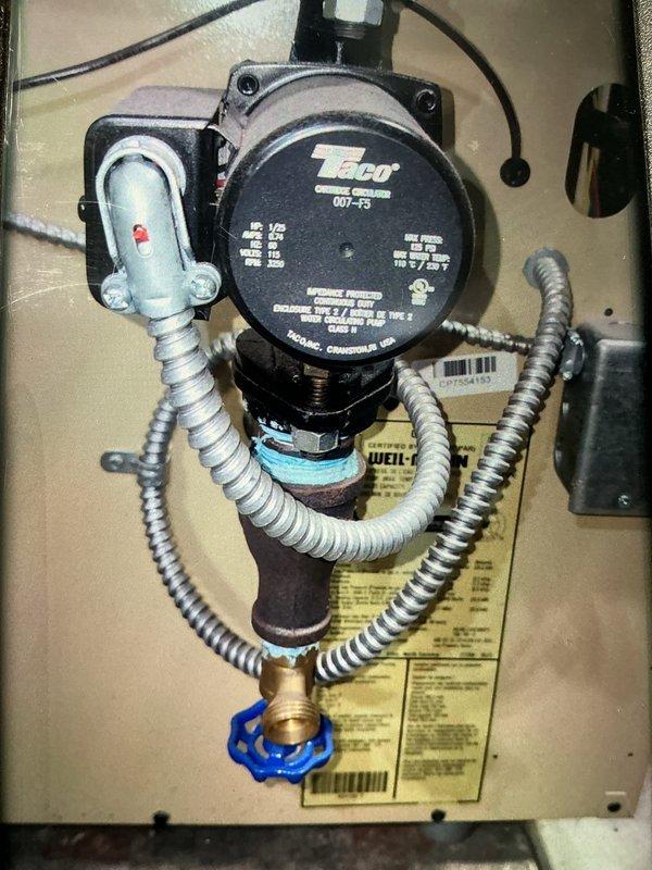 Completed scheduled tune-up maintenance on 7-year-old boiler system located in basement. Performed comprehensive inspection of all components including circulator pump (Taco 007-F5 model), pressure relief systems, automatic air vent, and associated piping. Noted moderate corrosion present on copper piping connections and threaded fittings, particularly around vertical supply lines, consistent with age of system. Verified proper operation of circulator pump, tested pressure gauge readings, and confirmed all isolation valves functioning correctly. System operating within normal parameters with no immediate repairs required at this time.