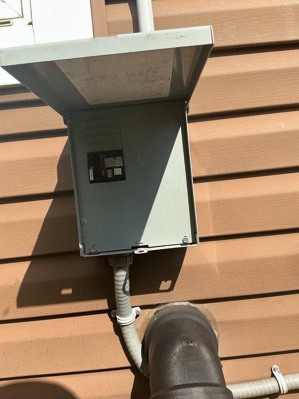 Responded to a no power call for a hot tub circuit. Upon inspection, diagnosed a failed Siemens 50-amp GFCI breaker in the exterior disconnect box. Replaced the defective GFCI breaker, restored power to the hot tub circuit, and verified proper operation of all safety features.
